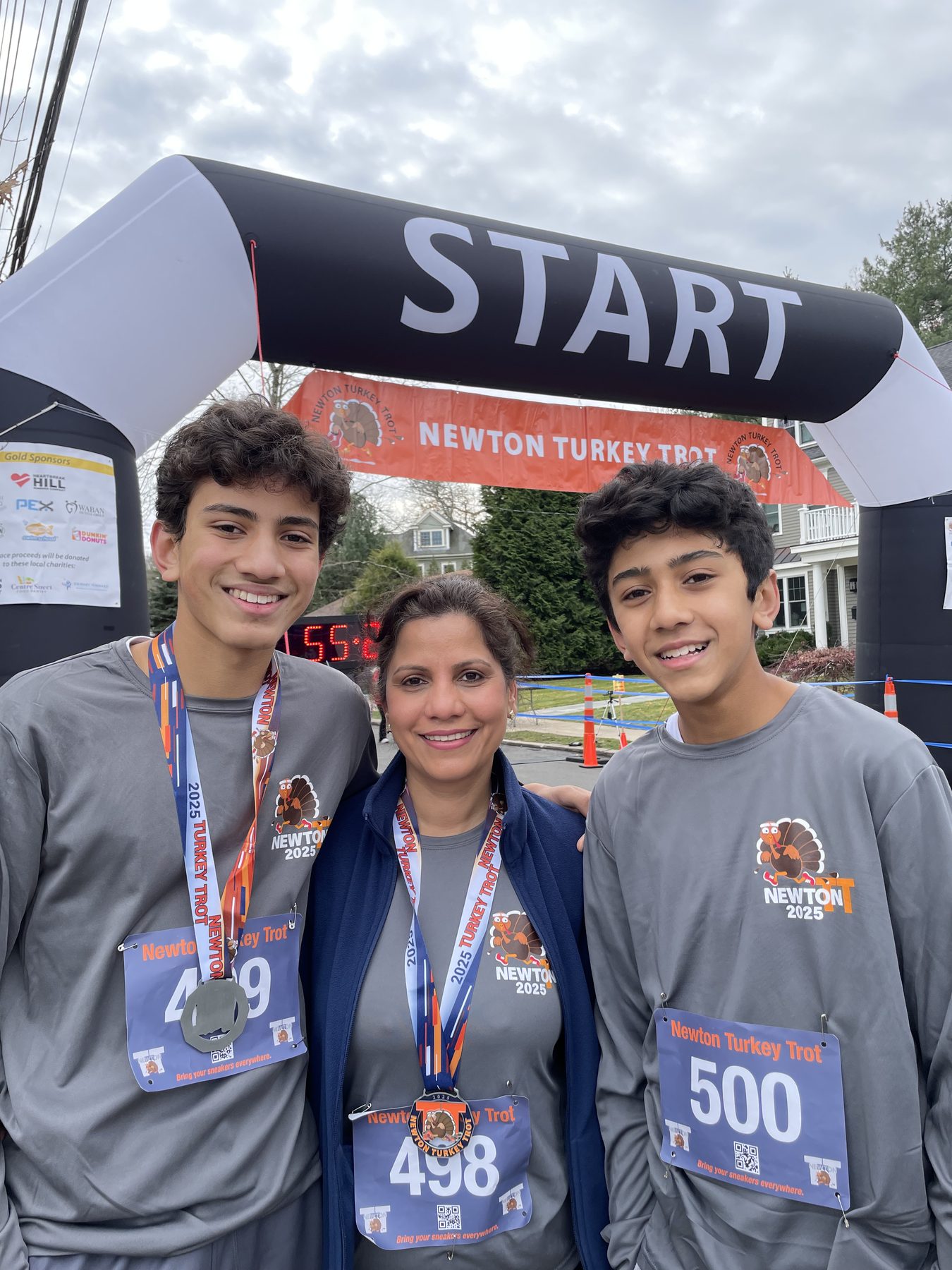 Me and my family at the finish of a Turkey Trot race