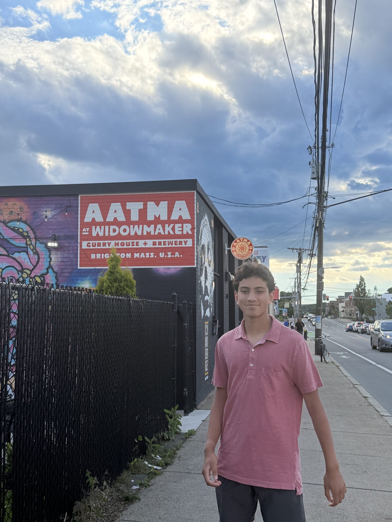 Me walking past a street mural